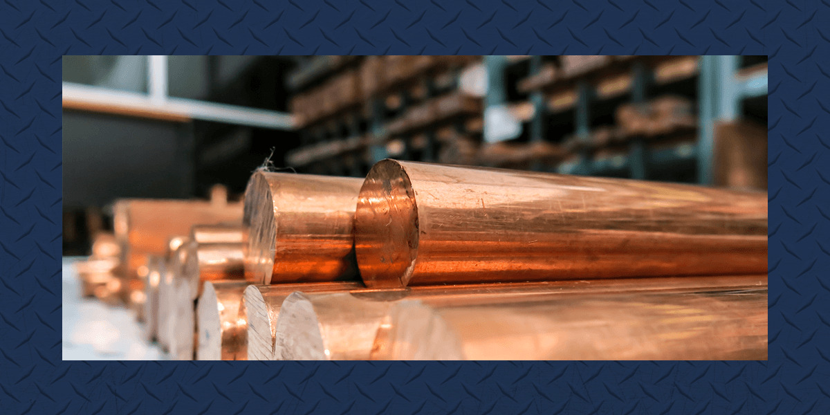 round bronze bars stacked on top of one another