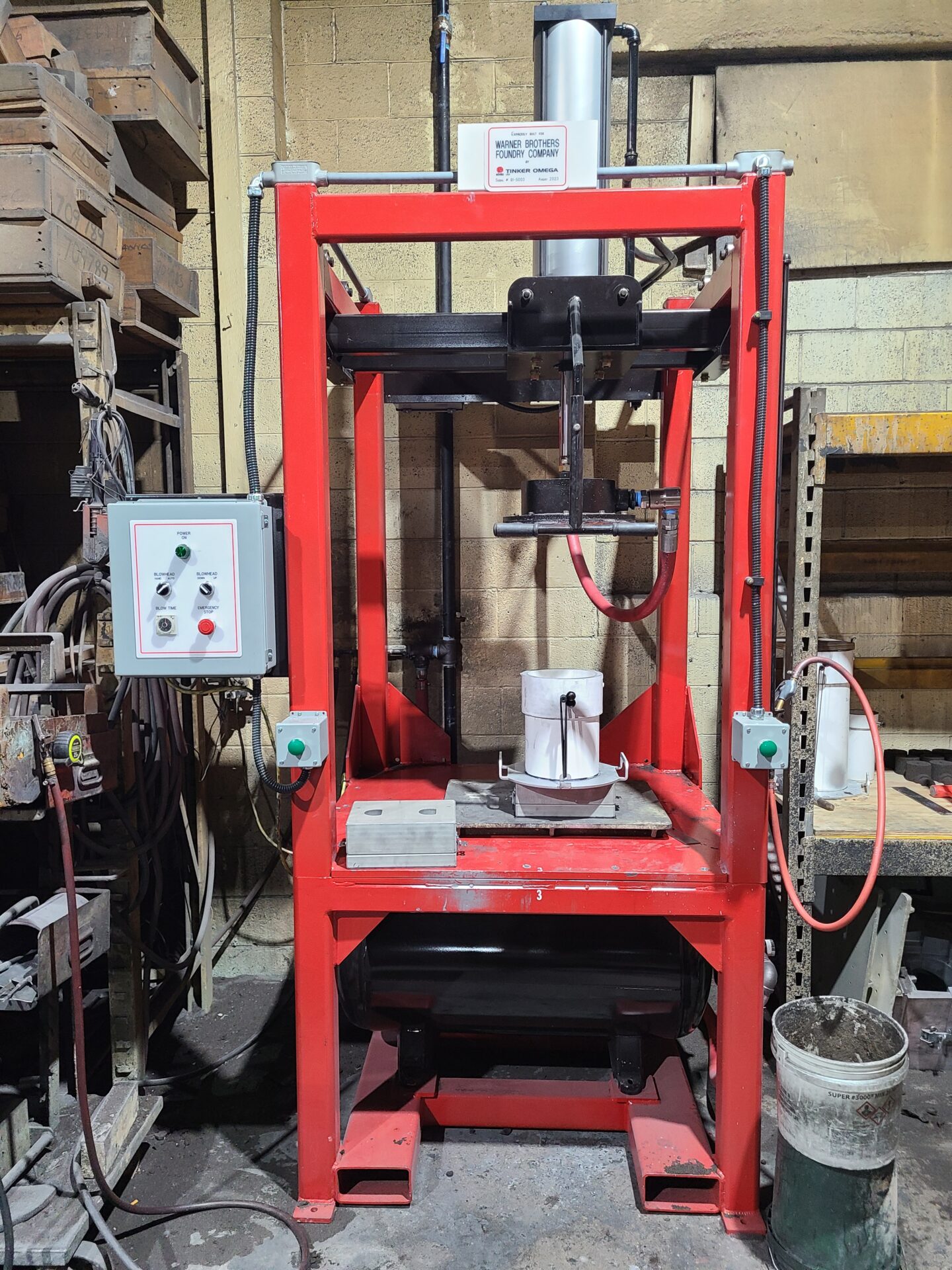 red NBBI-1 No-Bake Core System from Tinker Omega SINTO in the Warner Brothers foundry warehouse